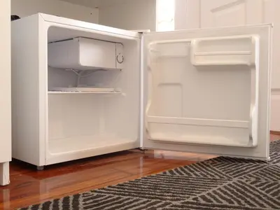 an empty white refrigerator with its door open at Museum House in Funchal