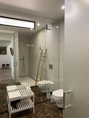 a bathroom with a toilet and a sink and a shower at Belvedere Boutique - Adults only in Funchal