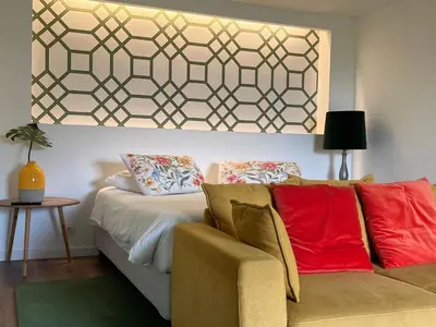 a living room with a couch and a table at Belvedere Boutique - Adults only in Funchal