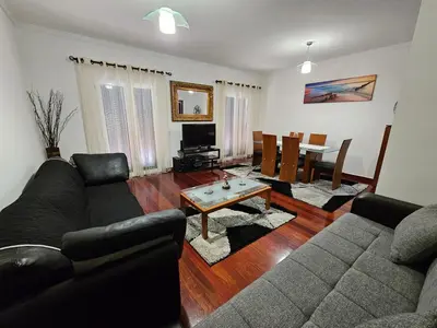 a living room with a couch and a table at Apartment Bonimar in Funchal