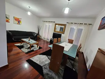 a living room with a couch and a table at Apartment Bonimar in Funchal