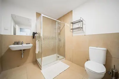 a bathroom with a shower and a sink at Funchal Paradise in Funchal