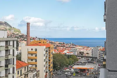a view of a city with the ocean in the background at Santa Catarina l by An Island Apart in Funchal