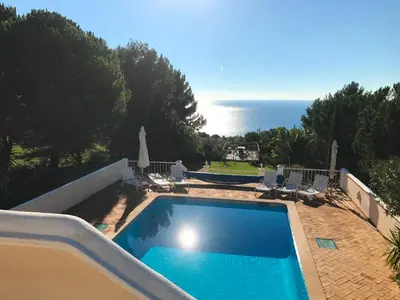 a swimming pool with a view of the ocean at Top Cliff Villa with Ocean View and Private Pool UP to 18 Guests in Burgau