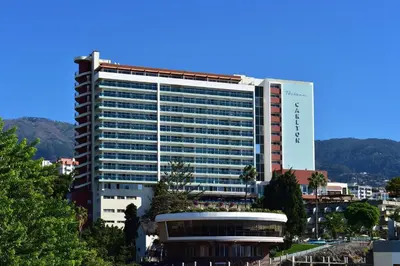 a large office building with a lot of windows at Pestana Madeira Beach Club in Funchal