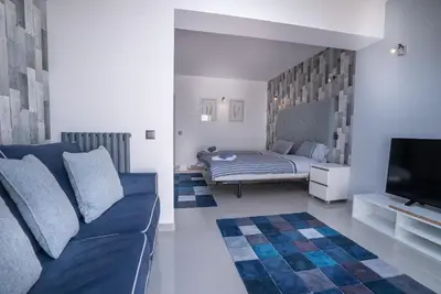 a kitchen with a sink and a window at ATLANTIC VIEW Apartment in Luz