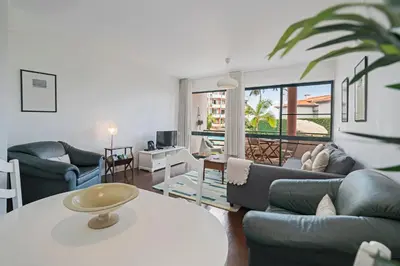 a living room with couches and a table at Varandas do Funchal II by An Island Apart in Funchal