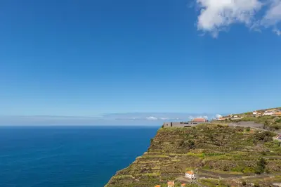 a view of the ocean from the top of a cliff at Casa Agrela by Rent2U, Lda Swimming Pool & Jacuzzi in Calheta