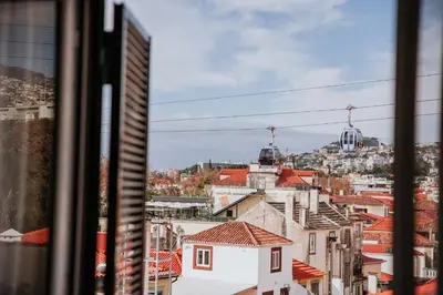 a view of a city from a window at Funchal Old Town Apartments 2.8 in Funchal