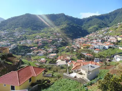 a view of a village on a mountain at Marques House in Machico