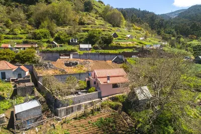 a view of a village in the hills at Casa do Avo in Arco da Calheta