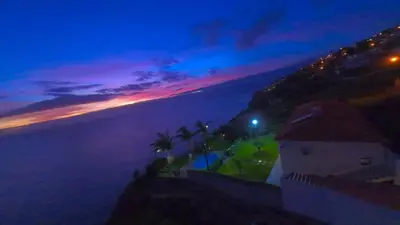 a view of the ocean at night at Casa Sol e Vista in Arco da Calheta