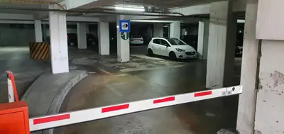 a white car parked in a parking garage at Funchal Apartament Marina View with PARKING FREE in Funchal