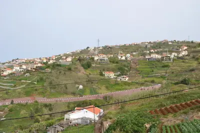 a village on a hill with houses on it at Casa do Serrado in Ponta do Sol