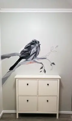 a painting on a wall above a dresser at Feel Funchal in Funchal