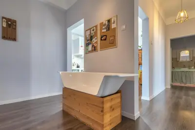 a bath tub in the middle of a room at Endemic - Concept Apartment in Funchal