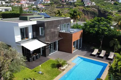 an aerial view of a house with a swimming pool at Villa Ravenala - by LovelyStay in Funchal