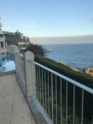 a balcony with a view of the ocean at Quinta Falesia Apartment in Funchal