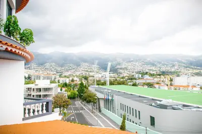a view of a city from a building at Barreiros House in Funchal