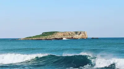 an island in the middle of the ocean with waves at OCEANUS ROOM With private kitchen, bathroom and terrace 300m from the beach in Sagres
