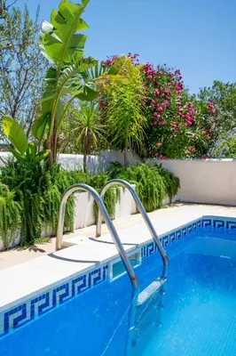 a swimming pool with a resort style swimming pool at Monte Sao Pedro - Villa in Luz