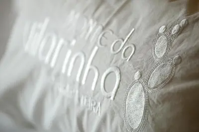 a close up of a mattress with footprints on it at Monte Da Vilarinha in Carrapateira