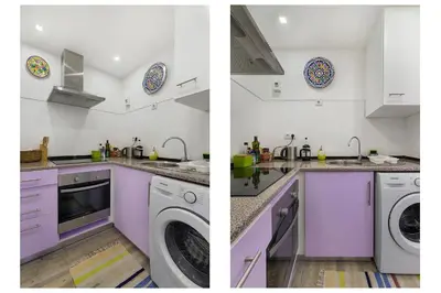 a kitchen with purple cabinets and a washer and dryer at The Lidosol - Phenomenal view over the Atlantic Ocean in Funchal