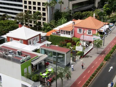 an overhead view of a city with houses and a street at The Lidosol - Phenomenal view over the Atlantic Ocean in Funchal