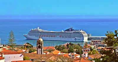 a cruise ship is docked in the ocean at vista dos arrifes in Funchal