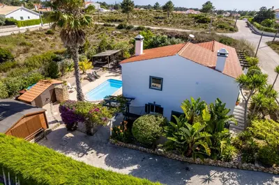 an aerial view of a house with a swimming pool at Casa Skip in Aljezur