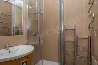a bathroom with a sink and a shower at Seaview Apartment H in Luz
