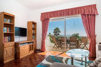 a living room with a view of the ocean at Seaview Apartment H in Luz