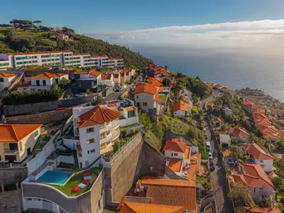 a view of the ocean from the balcony of a house at Funchal High View in Funchal