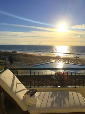 a balcony with a view of the beach and the ocean at Paradise Beach in Porto Santo