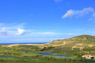 a view of a valley with two lakes and a mountain at Paradise Beach in Porto Santo