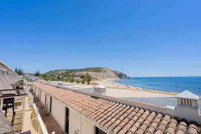 a view of the beach from the roof of a building at Luz Beach Apartments in Luz