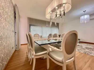 a dining room with a table and chairs at Casa Saramago by AnaLodges in São Vicente