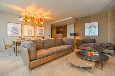 a living room with a couch and a table at Apartamento Astrolab in Funchal