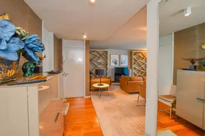 a living room with a couch and a table at Apartamento Astrolab in Funchal