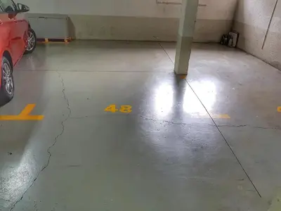 a parking garage with the number on the floor at Falesia Apartment - Reis Magos Beach in Caniço