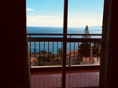 a view of the ocean from a window at Em casa longe de casa, tão bom! in Gaula