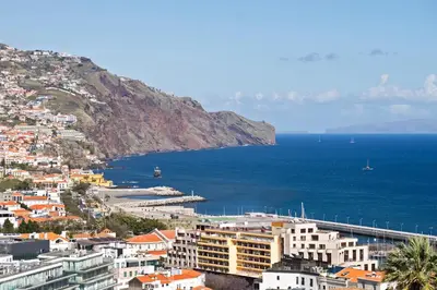a view of a city and the ocean at Jasmineiro II by An Island Apart in Funchal