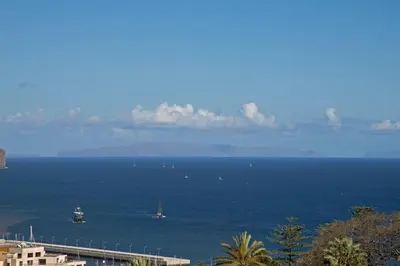 a view of a large body of water with boats at Jasmineiro II by An Island Apart in Funchal