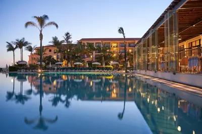 a gym with several treadmills and elliptical machines at The Residence Porto Mare - PortoBay in Funchal