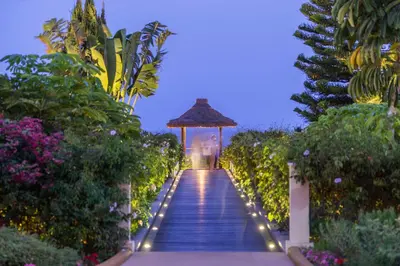 an aerial view of the resort with the ocean in the background at The Residence Porto Mare - PortoBay in Funchal