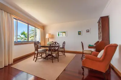 a resort with a pool and the ocean in the background at OurMadeira - 6001 in Funchal