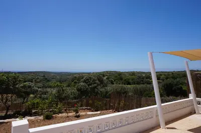 a view from the balcony of a house at Trivial Pisão - Casa de Férias, para a sua Família in Raposeira