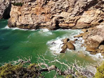 a view of a river with rocks in the water at Trivial Pisão - Casa de Férias, para a sua Família in Raposeira