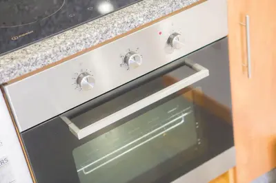 a black and white oven in a kitchen at Five Design Rooftop by Storytellers in Funchal