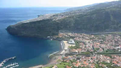 an aerial view of a beach and the ocean at Enzo Apartament in Funchal